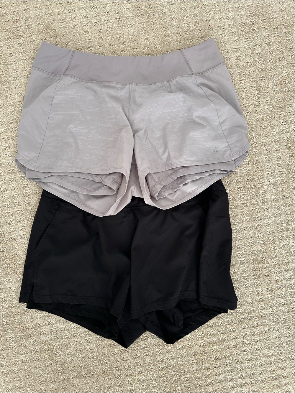 Set of 2 athletic shorts are likely the Layer 8 2-in-1 Quick Dry Running Shorts